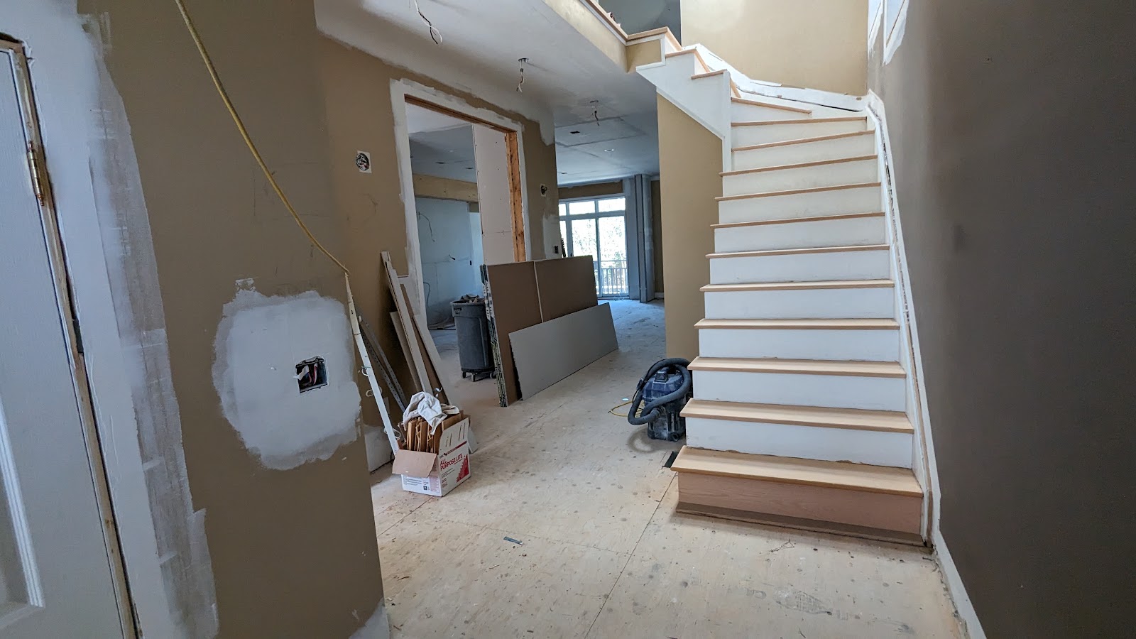 Staircase and hallway finish work in progress
